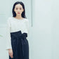 Pleated high-waisted trousers with one-sided pleat and tie-up detail (black/grey) Organic Cotton & Recycle