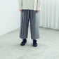 Pleated high-waisted trousers with one-sided pleat and tie-up detail (black/grey) Organic Cotton & Recycle